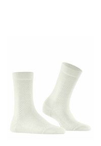Chaussettes en coton blanc avec un motif en chevrons, des bords côtelés, et des orteils et talons renforcés. Légères et conçues pour le confort.
