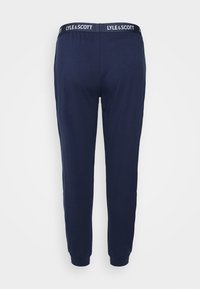 Calças de jogging azul-marinho com um cós canelado que apresenta a marca branca "LYLE & SCOTT". Tecido suave e pernas ajustadas com punhos elásticos.