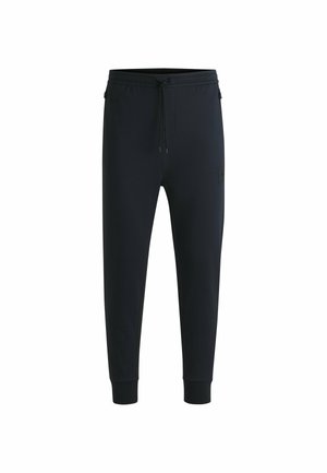 Svarta joggbyxor i mjukt tyg, med elastisk midja, dragsko, manschetter vid anklarna och en liten logotyp på sidan.