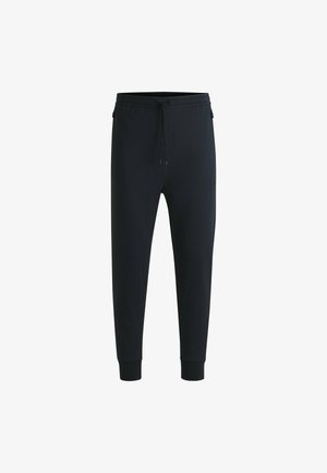 Pantalon de jogging noir en tissu doux, doté d'une taille élastique, d'un cordon de serrage, de chevilles côtelées et d'une petite étiquette logo sur le côté.