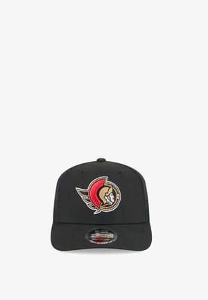 Black baseball cap with red and gold Ottawa Senators logo embroidered on front and a curved brim.