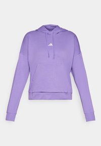 Fialová mikina s klokankou a kapucňou na šnúrku. Vyrobená z mäkkého materiálu, s malým bielym logom na hrudi a rebrovanými manžetami.