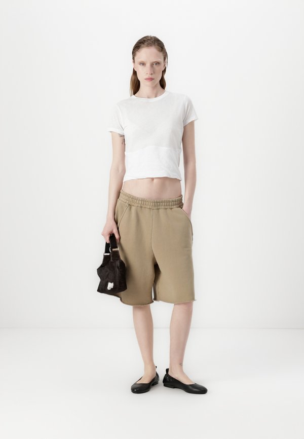 TRAVEL - Tracksuit bottoms - sand4