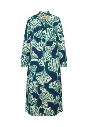 Langærmet kjole med en mørkeblå baggrund og store grønne og hvide bladmønstre. Enkel rund halsudskæring, længde til midten af læggen.