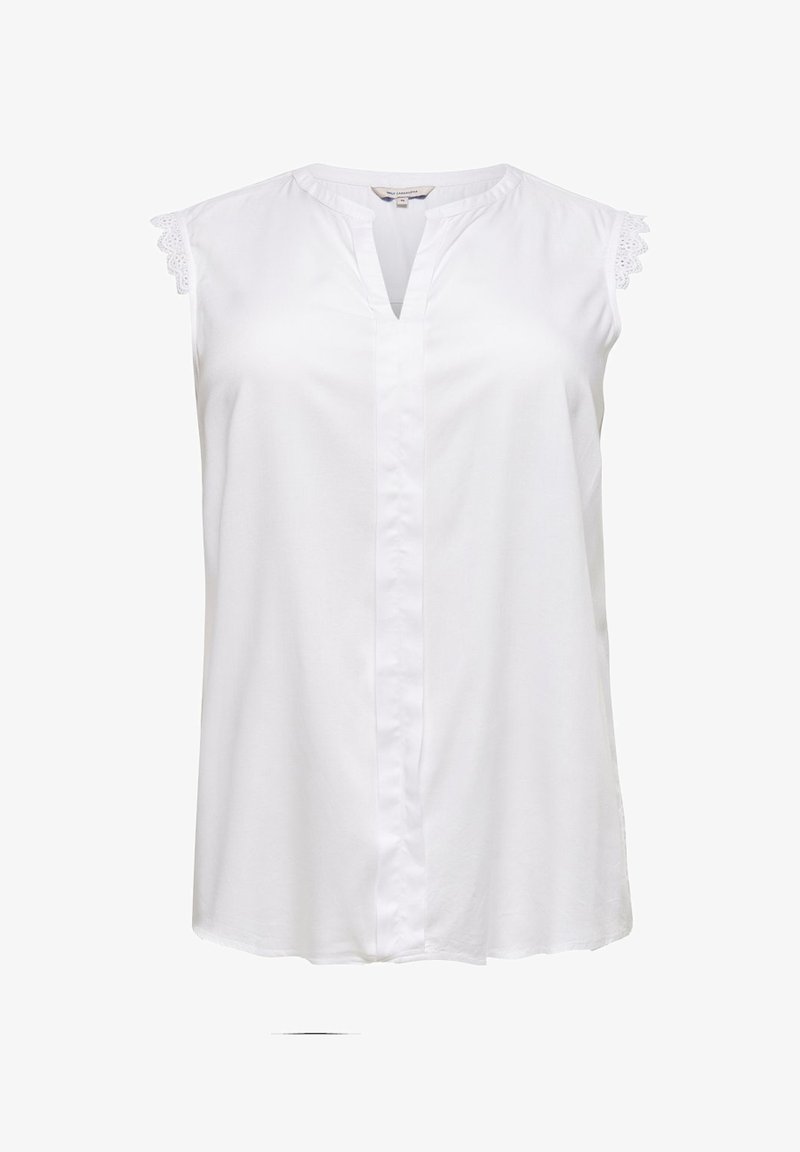 Λευκή αμάνικη μπλούζα από ελαφρύ ύφασμα, με λαιμόκοψη V και λεπτό δαντελένιο φινίρισμα στους ώμους. Άνετη εφαρμογή.