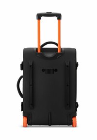 Valigia rigida nera con manico estensibile arancione brillante e ruote, manici laterali e superiori, vista dal retro.