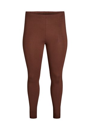 Braune Leggings aus weichem, dehnbarem Material; verfügen über eine glatte Textur, einen langen Schnitt und einen elastischen Bund für zusätzlichen Komfort.