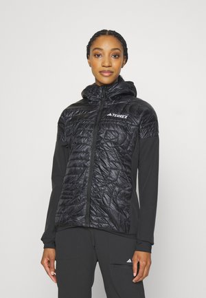 XPERIOR VARILITE HYBRID PRIMALOFT - Running jacket - black