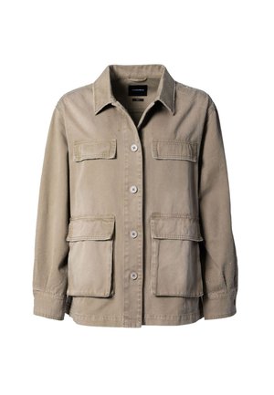 Beige värinen paitapusero, jossa neljä suurta etutaskua ja pienet kohotetut pistekuviot olkapäillä ja hihoissa.