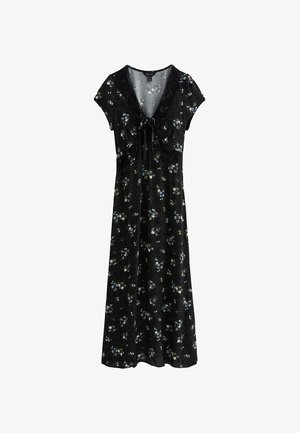 Czarna sukienka w kwiaty z krótkimi rękawkami, dekoltem w kształcie litery V, detalem nawiązującym do przewiązania w talii oraz zwiewną, sięgającą kostek spódnicą w kropki.