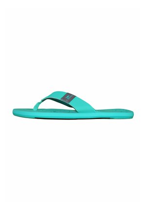 Turquoise flip-flop with a textured sole, featuring a smooth strap and a small logo patch in the center. Thin, lightweight design.