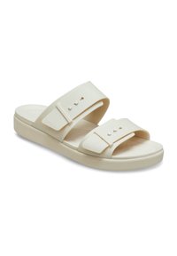 White slide sandals with two adjustable straps. Made of a smooth material, featuring textured footbed and a lightweight, cushioned sole.