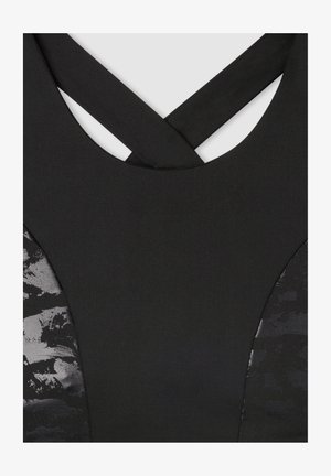 Top atletico nero con design a incrocio sul retro. Tessuto liscio con finitura opaca e motivo testurizzato nero sui lati.