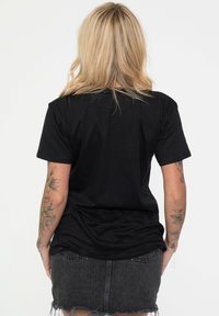 Paradiso Clothing BLUR CIRCLE BAND UNISEX - Print T-shirt - black