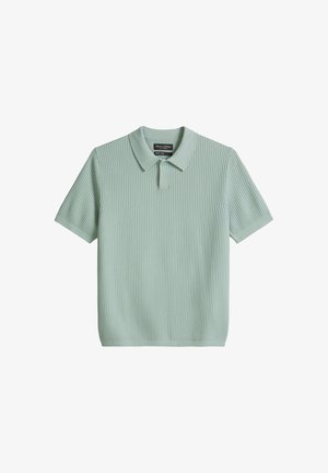 Mintgroen poloshirt met korte mouwen, ribbelstructuur, kraag en een enkele knoopsluiting.