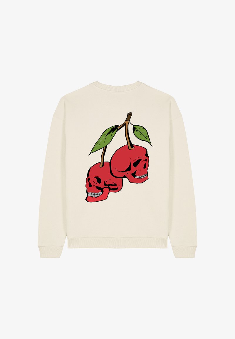 Crèmekleurige sweatshirt met een afbeelding van twee rode schedels met groene bladeren aan een bruine steel, gecentreerd op de achterkant. Zachte, casual stof.