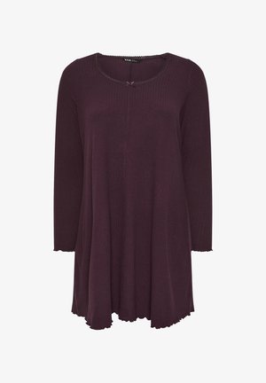 Langärmliges Kleid aus lilafarbenem Rippstoff mit rundem Ausschnitt, dekoriert mit einer Schleife und einem gewellten Saum, fällt locker an der Taille.