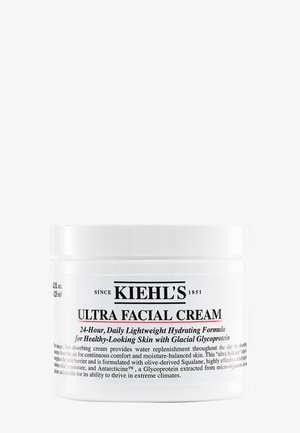 White jar of Kiehl's Ultra Facial Cream, labeled with black text. Contains 125 ml. Features a smooth, glossy surface and a screw-top lid.