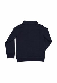 Laivastonsininen pusero kauluksellisella pääntiellä, pitkät hihat ja resorireunukset hihoissa. Pehmeää kangasta, sileäpintainen. Sivusaumassa on merkintä.