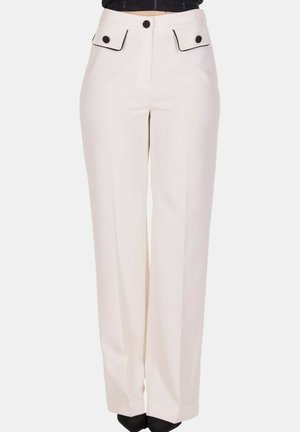 Pantaloni crema a vita alta con gambe ampie, dettagli con bottoni neri sulle tasche anteriori a patta e chiusura centrale davanti con bottone e zip.