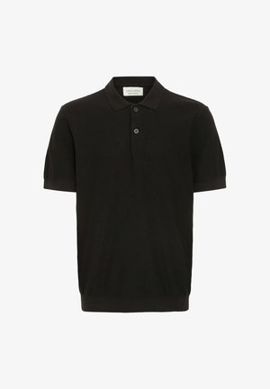 Svart kortermet polo-skjorte med strukturert overflate, treknapps placket og klassisk krage. Har en tettsittende ribbestrikket kant.