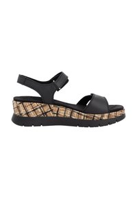 Sandale compensée noire avec des brides réglables, dotée d'une semelle texturée imitant le liège et d'un coussin de confort pour le pied.