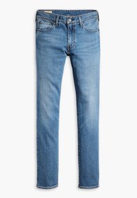 Jean en denim bleu clair avec une coupe slim, fermeture par bouton et fermeture éclair, passants de ceinture, poches avant et arrière.