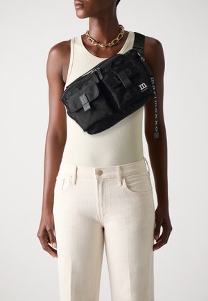 SLING BAG UNIKKO UNISEX - Cross body bag - black