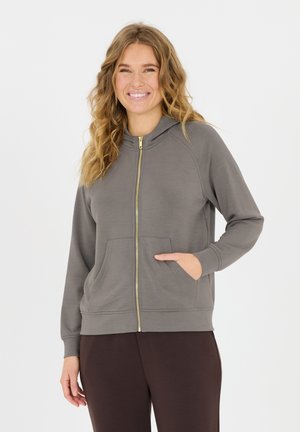 Gray zip-up hoodie with a gold zipper, front pockets, raglan sleeves, and a hood. Material appears soft with a smooth texture.
