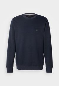 Námořnický modrý sweatshirt s kulatým výstřihem vyrobený z měkké látky. Obsahuje malé vyšívané logo na hrudníku a žebrované rukávy a lem.