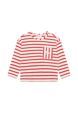 Langarmshirt in crèmekleur met rode horizontale strepen, voorzien van een klein zakje met een gestreept patroon en een subtiel accentdetail.