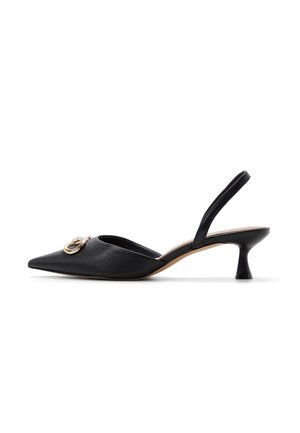 Black leather slingback kitten heel with pointed toe and gold circular buckle detail on front.
