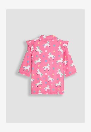 Ružičasta majica kratkih rukava s uzorkom jednoroga i višebojnim detaljima. Volani na ramenima. Mekani, rastezljivi materijal.