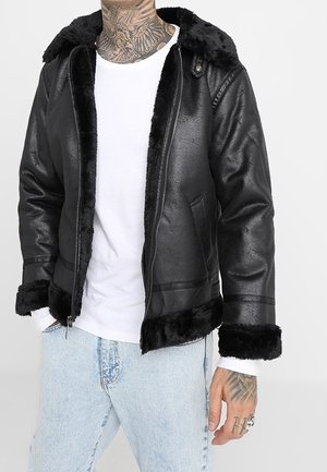 Faux leather jacket - black