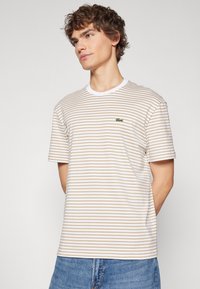 Lacoste Triko s potiskem - viennese/white