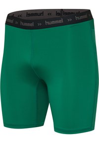 Groene sportshorts gemaakt van rekbare stof met een zwarte Hummel-logo tailleband. Beschikt over een gladde textuur en een aansluitend ontwerp.