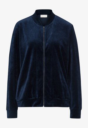Marineblaue Samtbomberjacke mit Reißverschluss vorne, geripptem Kragen, Bündchen und Saum, glatter Textur und minimalistischem Design.