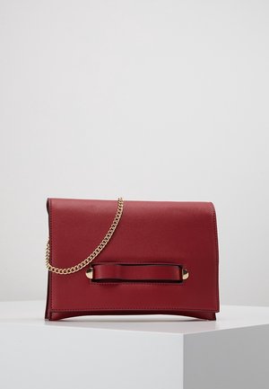 Axelremsväska - red