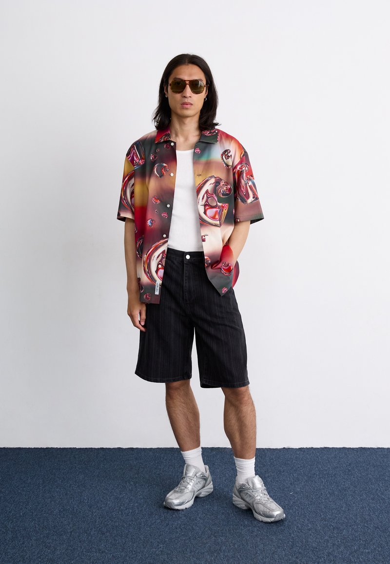 Carhartt WIP RYLAN - Džínové kraťasy - black stone washed