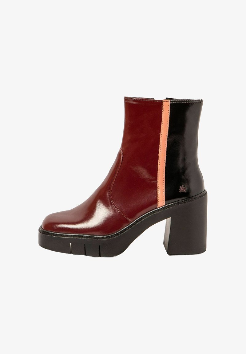 Burgundy and black leather ankle boot with a pink accent. Features a chunky heel, rounded toe, and smooth, shiny surface texture.