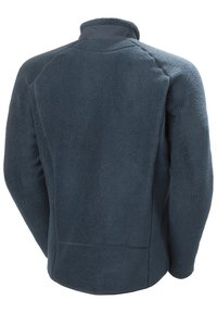Fleece'owa kurtka w ciemnoniebieskim kolorze, z wysokim kołnierzem i teksturowanym wykończeniem. Projekt obejmuje raglanowe rękawy i prosty dół.