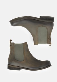 Stivali alla caviglia in pelle marrone con pannelli laterali elasticizzati, punta arrotondata, linguetta e suola texturizzata. Il design presenta un tacco in legno scuro.