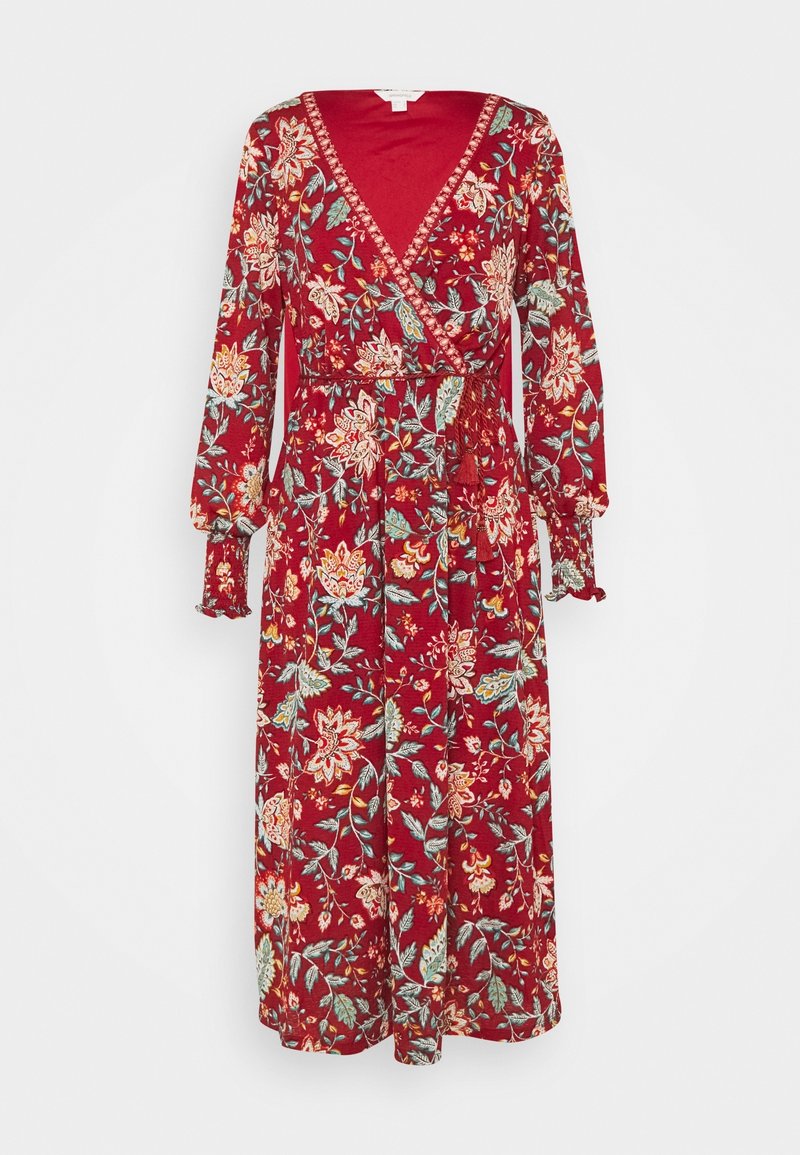 Robe portefeuille rouge à fleurs avec manches longues, présentant un décolleté en V profond, une taille cintrée et des poignets élastiques à volants. Motif floral en crème et sarcelle.