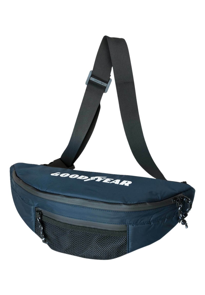 Navy blue shoulder bag with a rounded shape, featuring a zippered main compartment and a mesh front pocket; "GOODYEAR" logo on top.