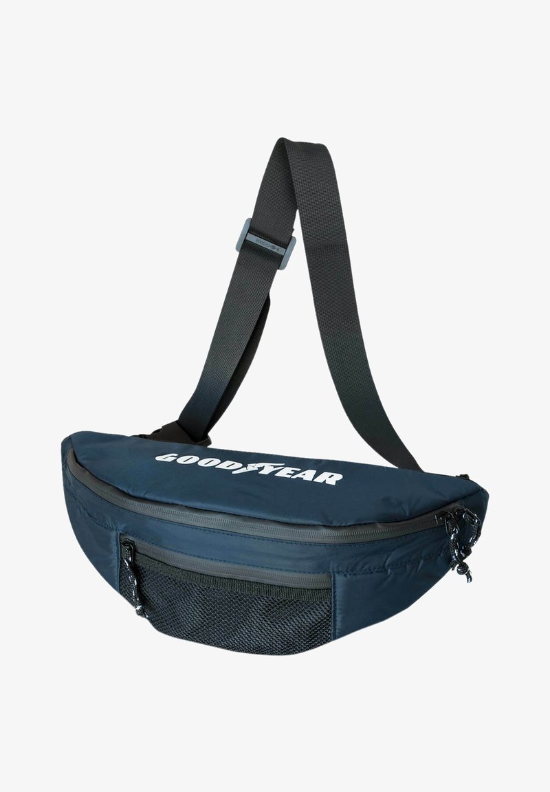 Navy blue shoulder bag with a rounded shape, featuring a zippered main compartment and a mesh front pocket; "GOODYEAR" logo on top.