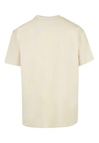 Kortærmet t-shirt, cremefarve, blødt bomuldsstof, klassisk rund halsudskæring, simpel skæring, ingen synlige logoer eller mønstre, ensfarvet bagside.