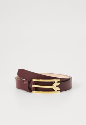 Burgundy leather belt with a gold metal buckle featuring a unique double-H design. Smooth texture and sleek shape for a modern look.