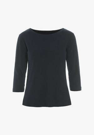 Top noir ajusté pour femme à manches longues avec un col rond et un tissu légèrement texturé.