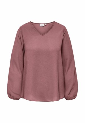 Top à manches longues en V en mauve, avec un tissu texturé et des poignets froncés. Design ample et finition lisse.