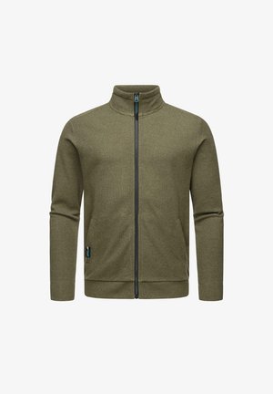 Oliivivihreä vetoketjullinen takki korkealla kauluksella, teksturoidusta kankaasta valmistettu, jossa on kaksi sivutaskua ja musta vetoketju sekä yksityiskohtia.